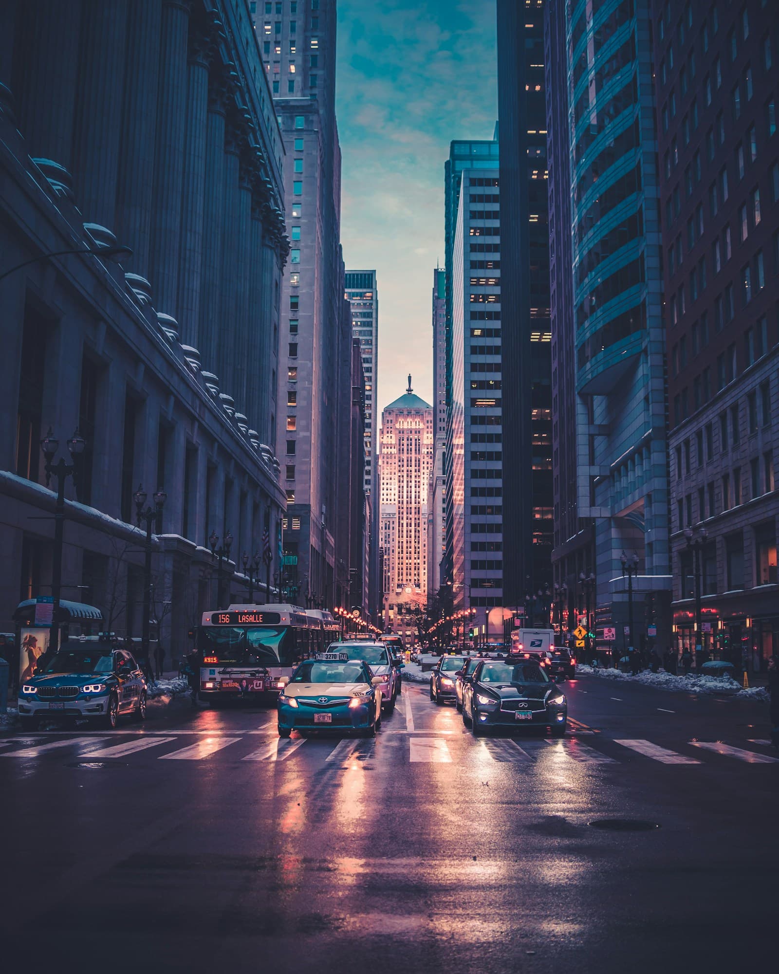 Sunlight between tall city buildings